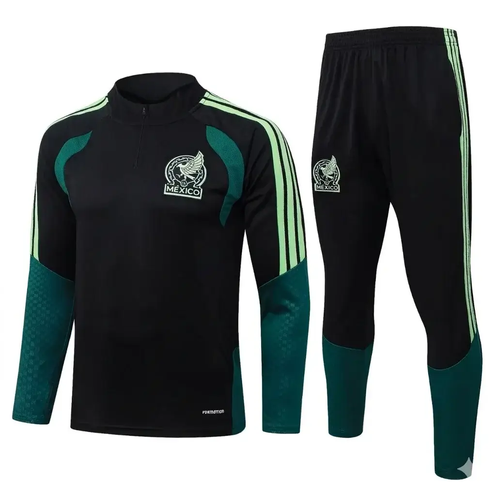 Unbranded (no Adidas logo) Mexico National Team black long-sleeved training kit with vibrant lime green vertical stripes, teal mesh underarm panels, and textured teal panels on sleeves and lower legs. The detailed Mexico crest with "MÉXICO" text is prominent on the left chest and right thigh. The kit features a 1/4 zip collar and includes matching pants. The clean image is ready for a wholesale product page.